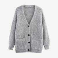 Long sleeved knitted cardigan sweater